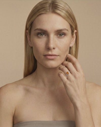 Rainbow Pomme Orange diamond ring worn on model