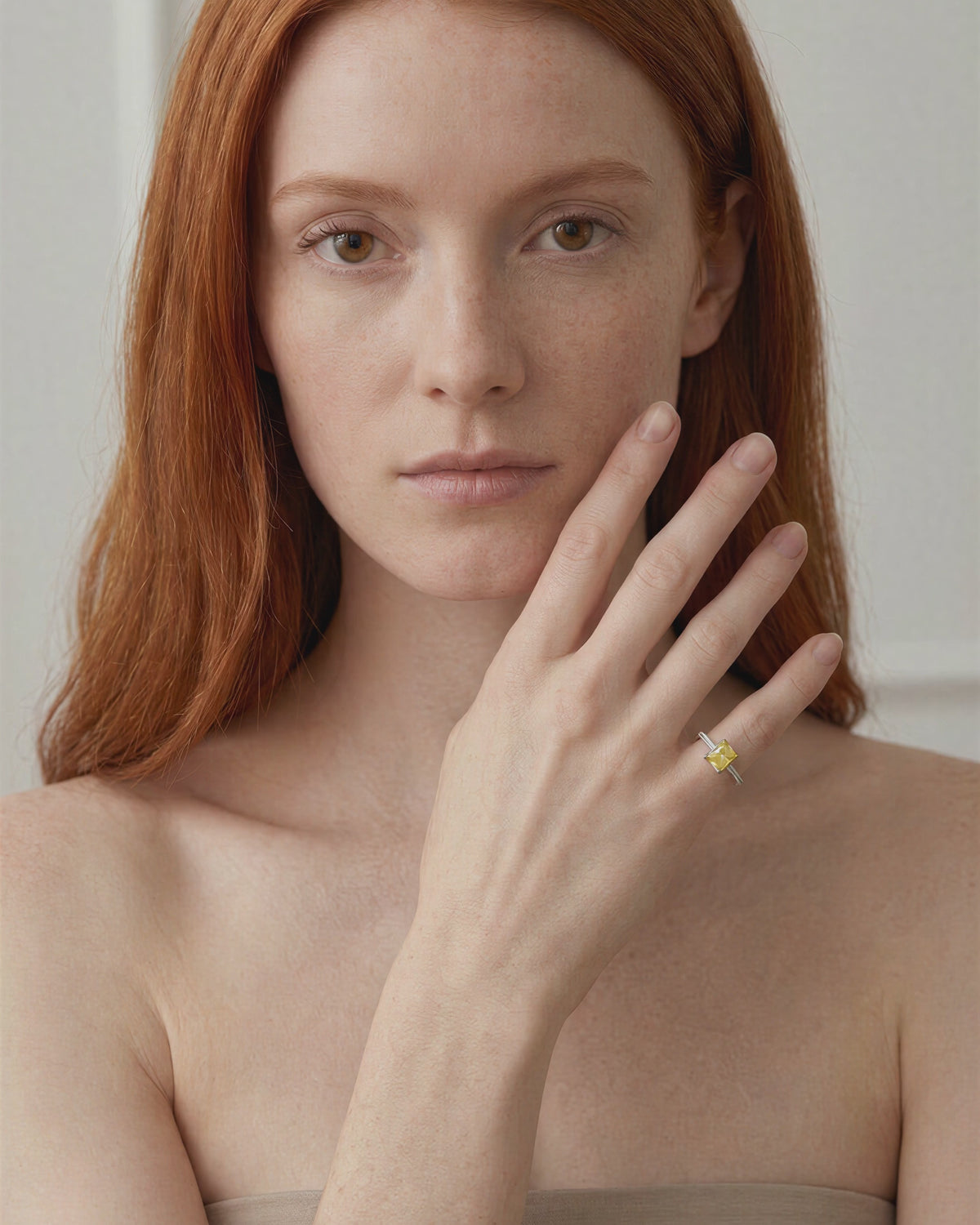 Fancy Vivid Yellow Diamond pinky ring worn on model