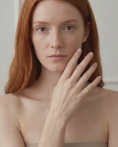 Fancy Vivid Yellow Diamond pinky ring worn on model